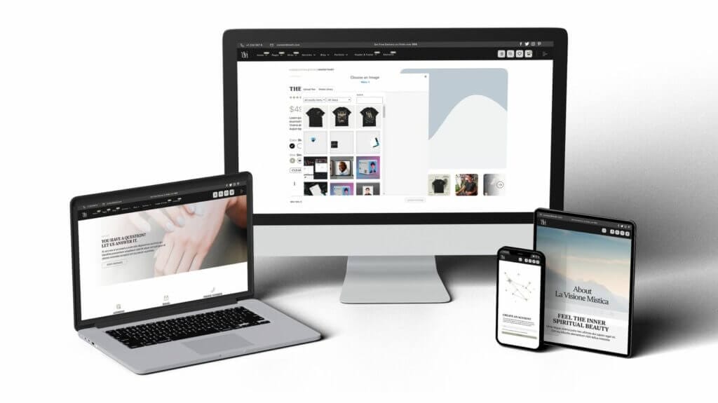 A laptop, a tablet, and a phone displaying a simple website design.
